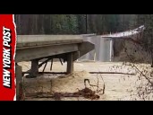 Watch Moment Bridge is Ripped Apart by Overflowing River in Montana