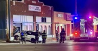 Van crashes into Delano business following traffic incident; One injured