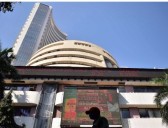 Stock markets rally as RBI cuts interest rate; Sensex jumps 447 points