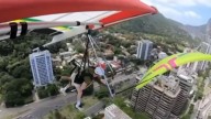Paraglider falls 150ft to death after being clipped by hang glider in mid
