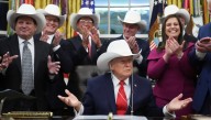 Trump dons cowboy hat with 'Miracle on Ice' Olympic hockey team