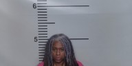 Woman arrested in connection to shooting near Heritage Creek