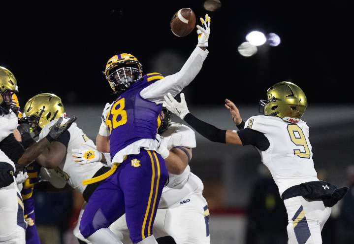 Roman Catholic gets revenge, runs past Bishop McDevitt for first state title