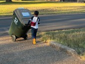 I don't give my 7-year-old an allowance. Instead, he runs a neighborhood business, where neighbors pay him to take out their trash.