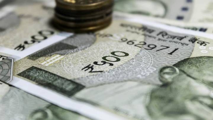 Rupee continues to slide, opens 22 paise down at 90.41 against dollar