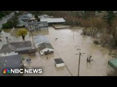 Race to rescue people trapped in Washington floods