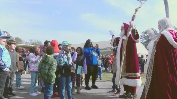 Santa and Mrs. Claus land in helicopter to greet elementary school students in Jefferson County