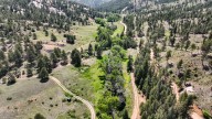 Former 400-acre Camp Fire campground resurfaces for sale near Conifer