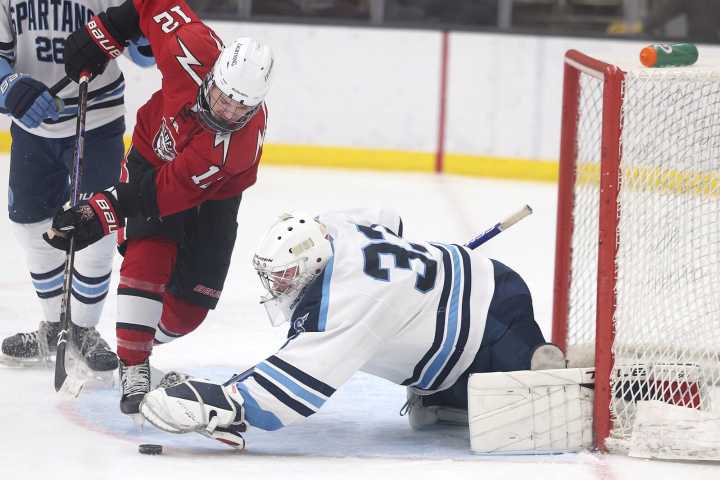 Pettingill ‘standing on his head’ for Spartans boys hockey