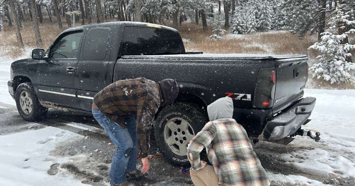 Colorado drivers struggle with chaining up along I-70 during winter storms, despite a new law meant to help