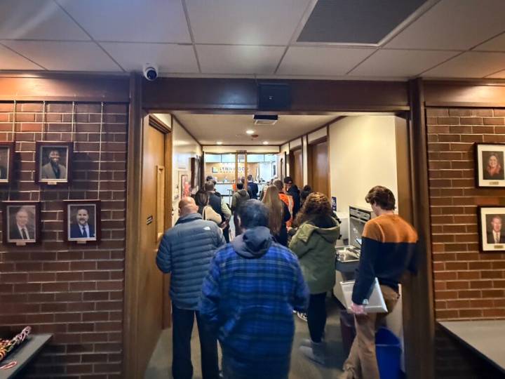 City Hall packed for four-hour meeting: Council approves business and permit fee increases, electeds take office