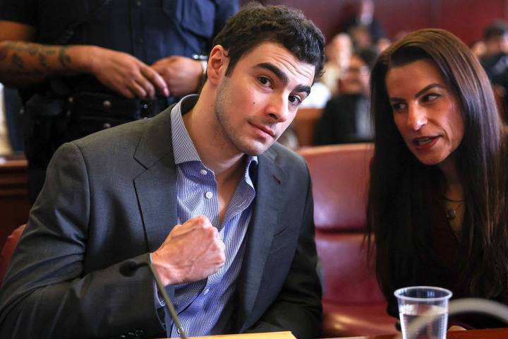 Luigi Mangione Pumps Fist in Court — Before Cop Says Ammunition Was Found in Pair of Underwear