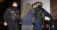 Silence turns to chaos as police smash through door of suspect linked to 'one of the largest' drug conspiracies in UK