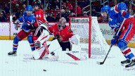 Knight makes 21 saves, helps Blackhawks shut out Rangers