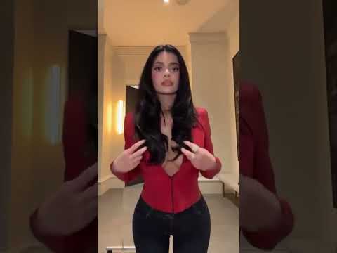 Kylie Jenner Unzips Red Jacket in New Clip