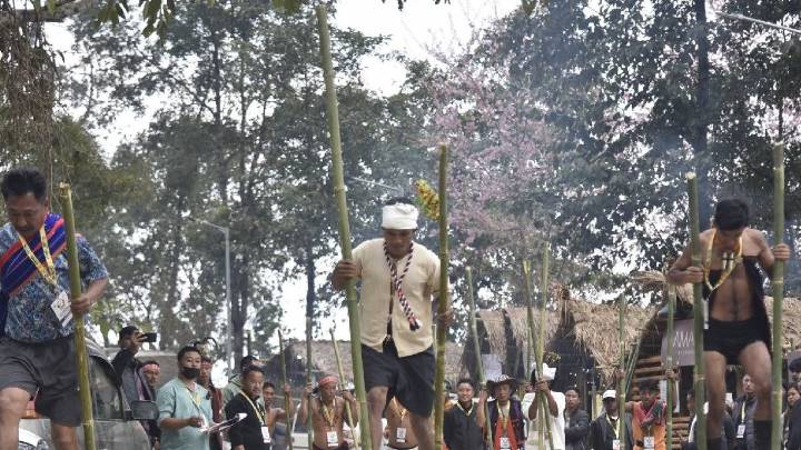Tourists join Naga bamboo stilt race as Hornbill Festival draws strong global participation