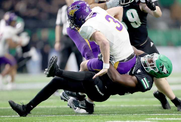 UND football places eight on all