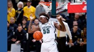 No. 7 Michigan St beats Iowa 71-52 to open defense of Big Ten title