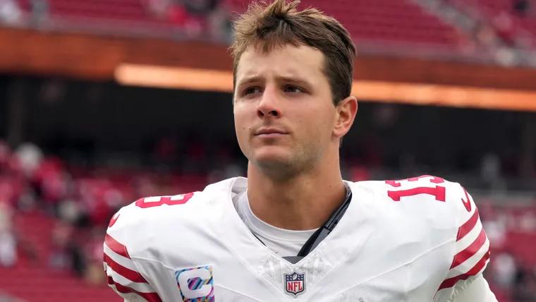 Brock Purdy and wife show off matching fits at 49ers' ugly sweater Christmas party