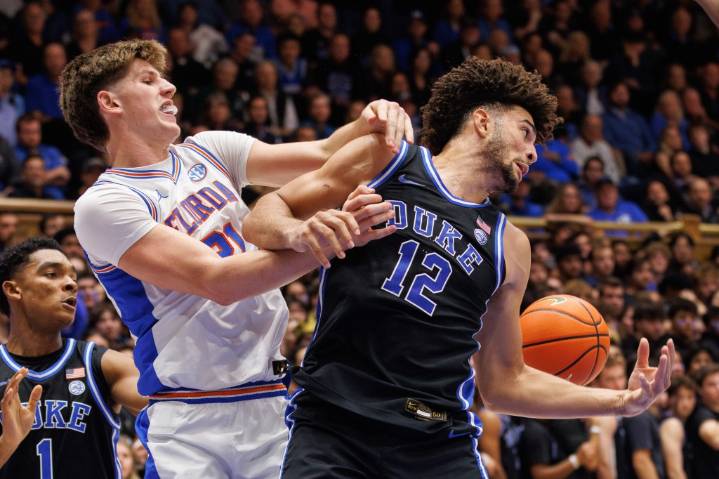Evans’ late 3 helps No. 4 Duke top No. 15 Florida in ACC/SEC Challenge