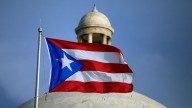 A new federal report scrutinizes Puerto Rico's tax incentives luring wealthy Americans