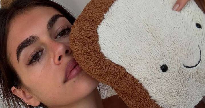 Kaia Gerber's Lingerie Under Fishnets Heats up W Mag Photos