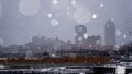 See photos as fresh snow falls over downtown Des Moines