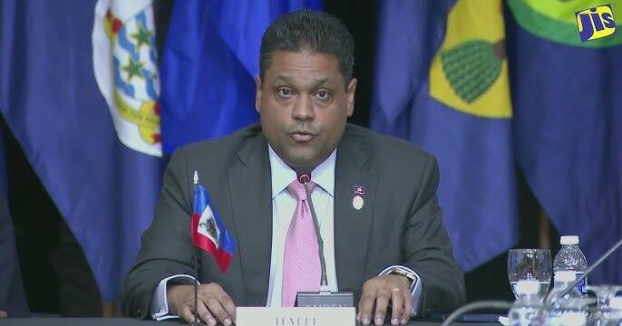 Haiti’s transitional government adopts key law to hold a general election for first time since 2016