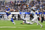 Matthew Stafford rallies Rams to 41-34 victory over Lions, clinching another playoff berth