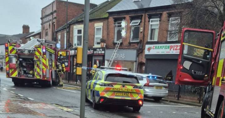 Two people taken to hospital after fire rips through building on Derbyshire high street