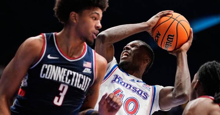 Freshman guard Braylon Mullins scores 17 points as No. 5 UConn rallies past No. 21 Kansas 61