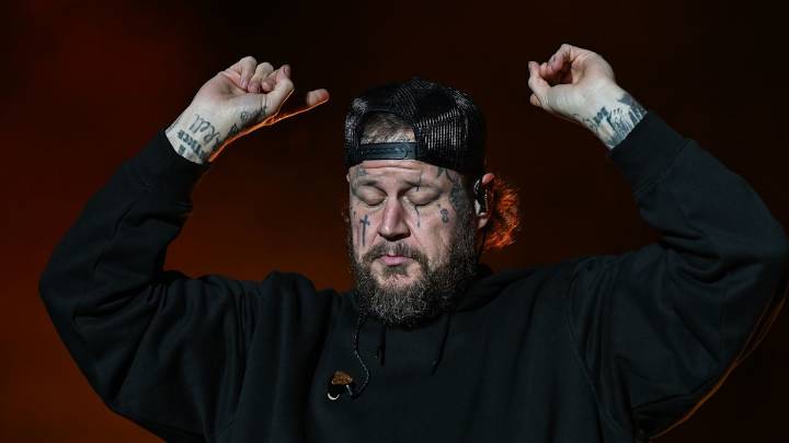 Jelly Roll breaks down in tears as he is invited to join the Grand Ole Opry