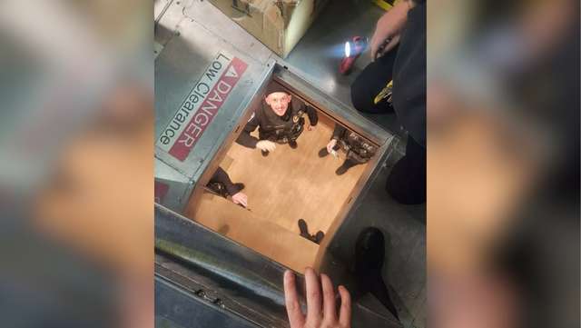 LFD crews rescue LMPD officers stuck in elevator