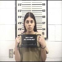 Woman gets 12 years for role in love-triangle murder plot