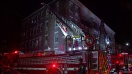 2 hospitalized after fire in Boston apartment building