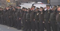 Philadelphia police escort body of Officer Andy Chan to headquarters: "An absolute legend in our department"