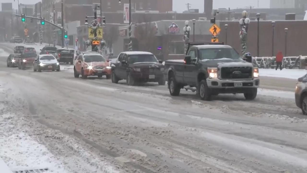 Winter's first big snowstorm hits the Northeast as schools close and traffic slows