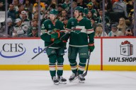 Quinn Hughes scores in Minnesota debut as Wild beat Bruins 6