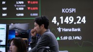Asian benchmarks mostly decline as investors anticipate US rate cut