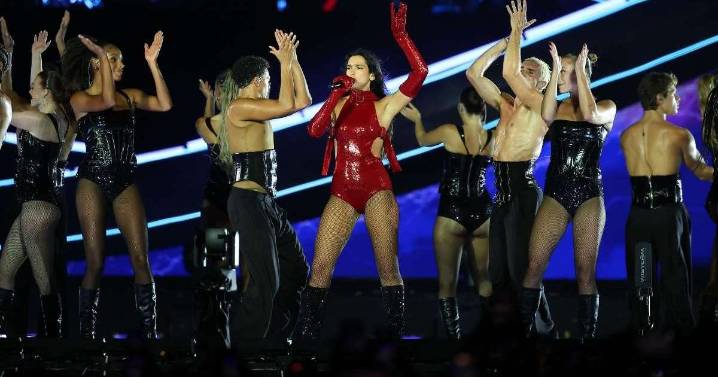 Dua Lipa's Red Bodysuit Has Just Two Belts Holding It Up