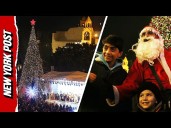 Hundreds Gather in The West Bank to Witness First Christmas Tree Lighting Since Start of Gaza War