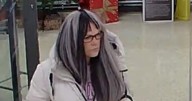 Woman banned from wearing wigs in shops