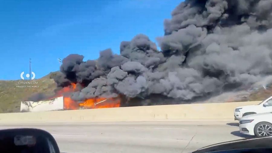 Semi crash sparks brush fire near 15 Freeway in San Bernardino; 1 injured