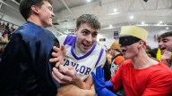 Taylor Silent Night court storm video, costumes, college basketball tradition