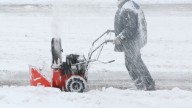 Marengo man suffers hand injury after reaching into snow blower
