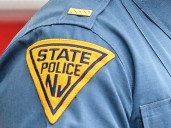 Driver arrested for pointing gun at motorist on Route 287, police say