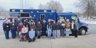 Dunbar High students stuff ambulance with toys for pediatric patients