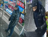 Armed robbers assault employee and flee in gray Mercedes SUV after daytime heist