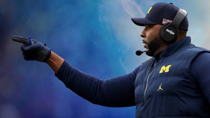 After Michigan Fires Moore ‘for Cause,’ Ex-Coach Is Detained in Jail