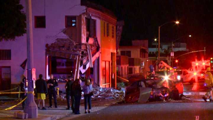 Driver hospitalized after BMW plows into Santa Monica print shop